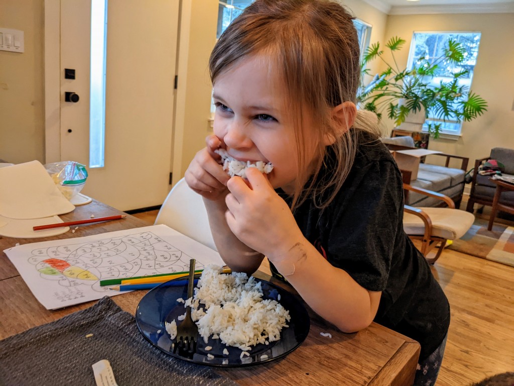 You assign yourself one chunk of rice per math problem completed.